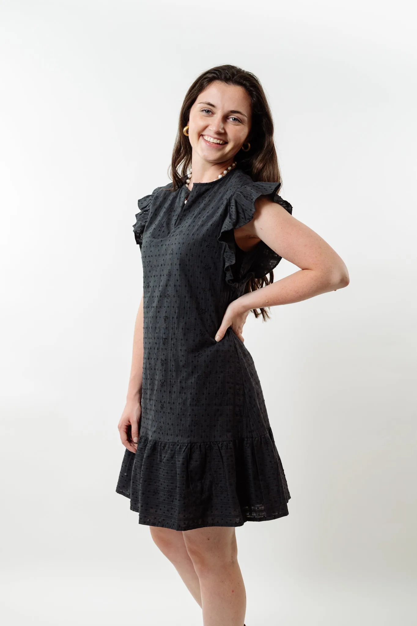 The Willow Flutter Sleeve Dress in Black Eyelet