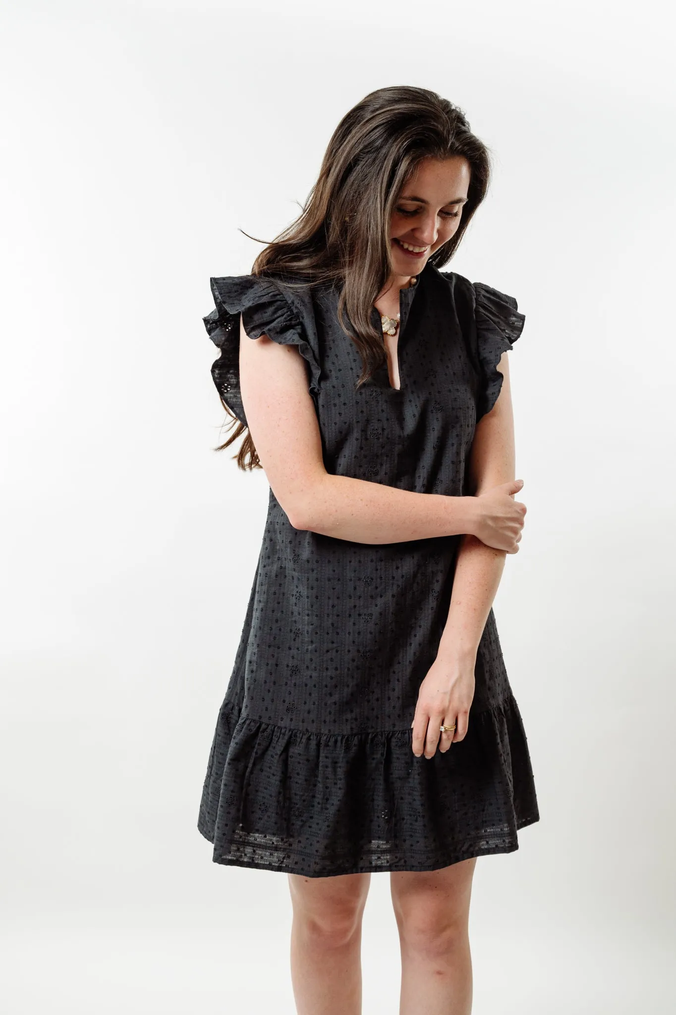 The Willow Flutter Sleeve Dress in Black Eyelet